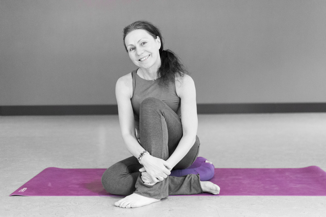 Sue Sinclair on Purple yoga mat